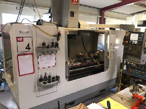 HAAS VF-4 CNC VERTICAL MACHINING CENTRE VF4 (WITH ONLY 4200 HRS AND 4TH AXIS)